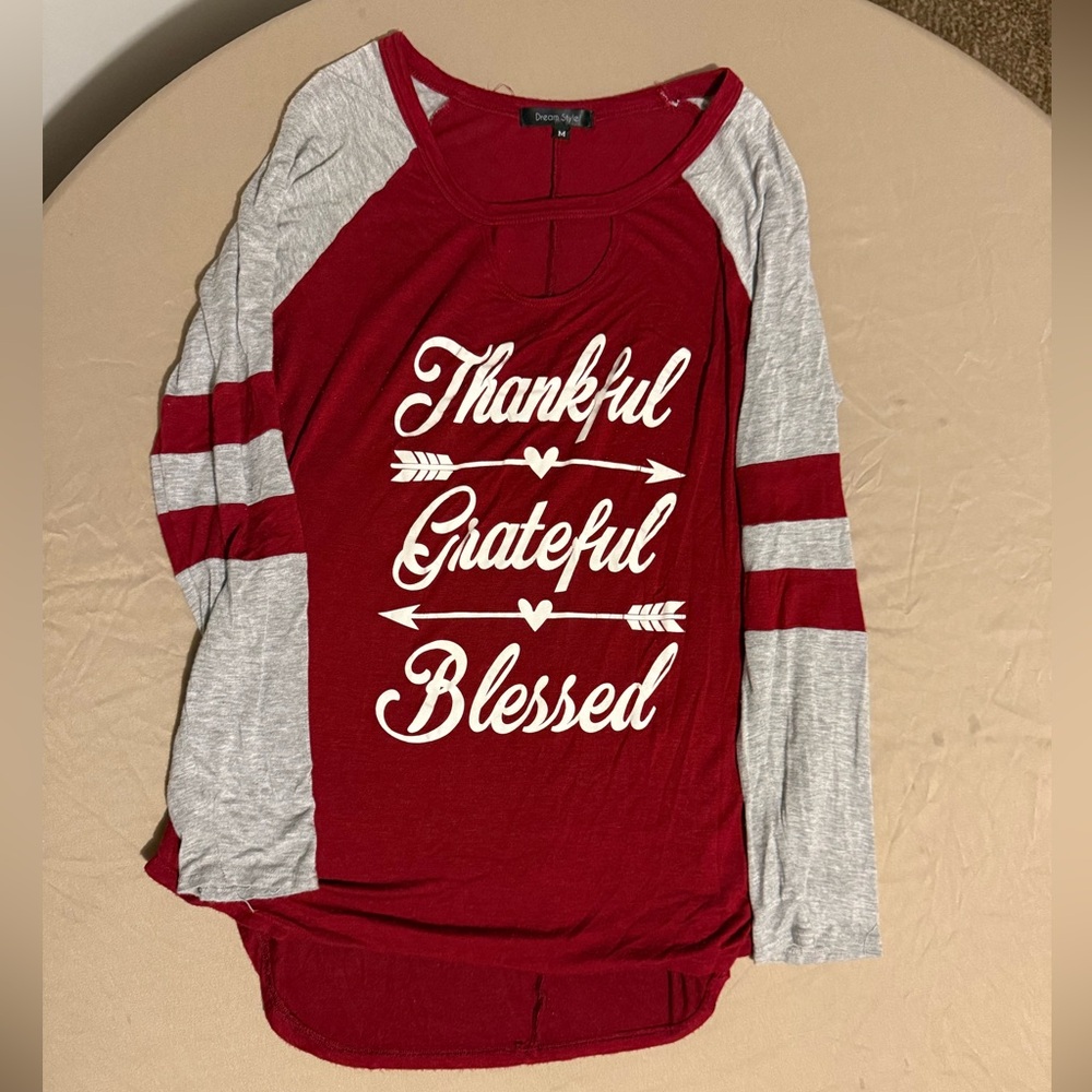 Burgandy Jersey style long sleeve t-shirt. Size Medium. Brand is Dream Style.